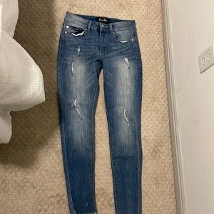 Long skinny jeans distressed